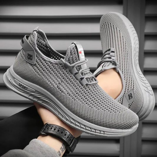 👟【39-44】Kényelmes és légáteresztő hálós, csúszásmentes, divatos alkalmi férfi cipő